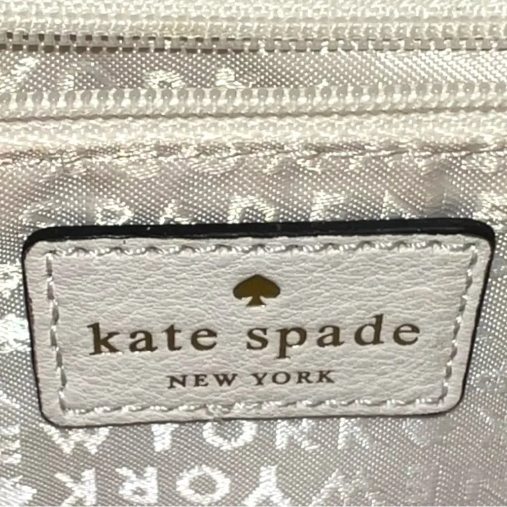 Kate Spade envelope purse. Cream with brown trim . Euc!